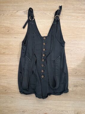Never worn Free People loose dark grey romper